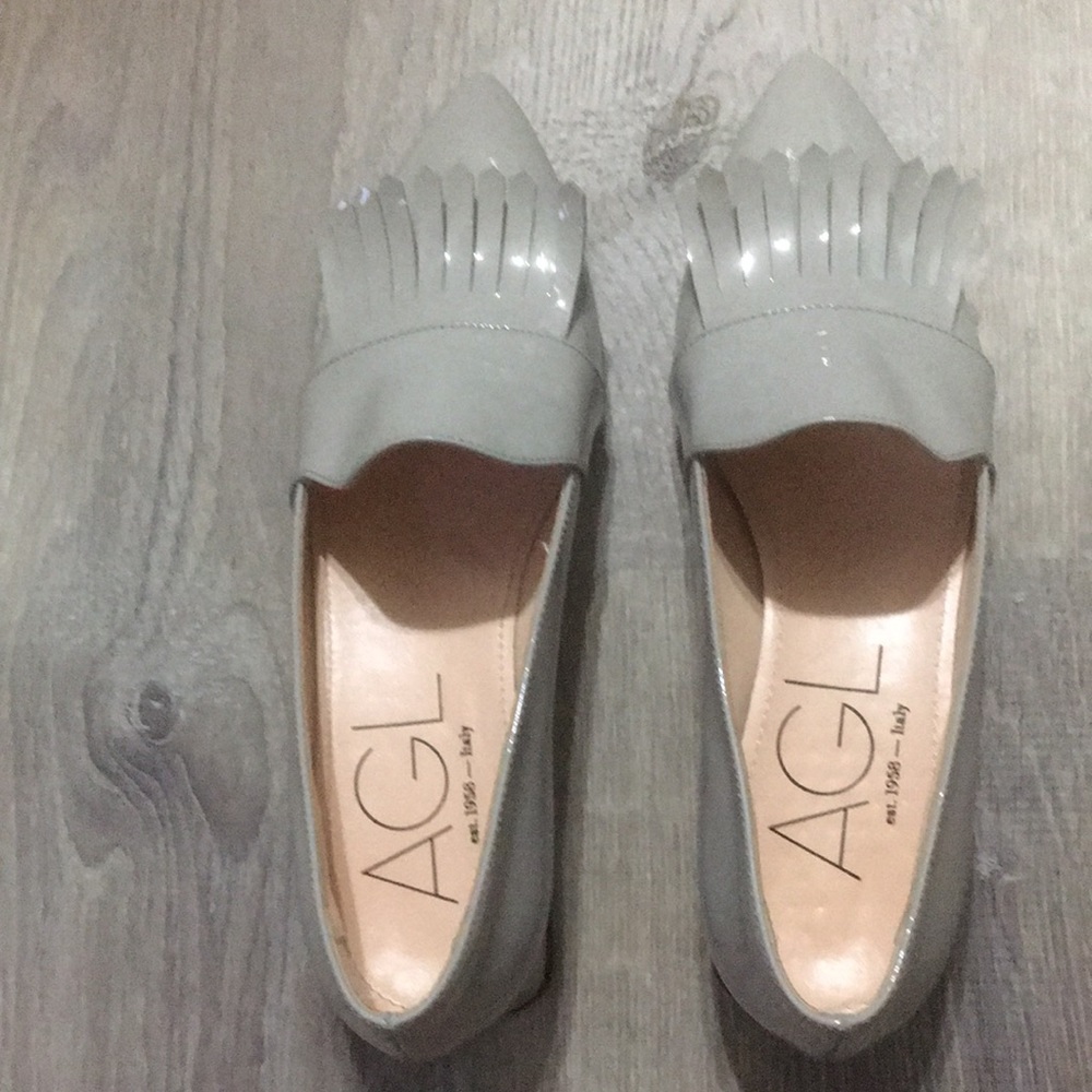 AGL originally 310.00. Gray patent leather shoes